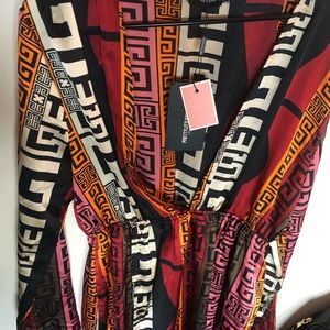 Pretty little thing tunic dress multi color Aztec style cover up.